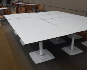 Push together as many tables as you need.